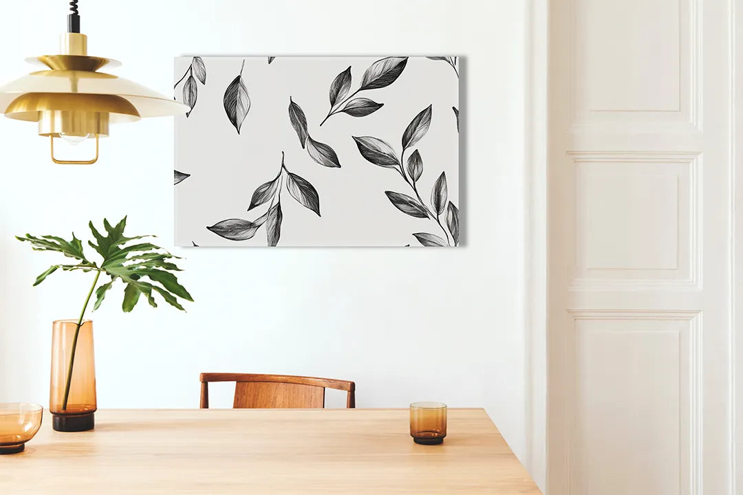 Kurkborden op canvas met zwart-wit vallende bladeren – formaat 100 × 70 cm