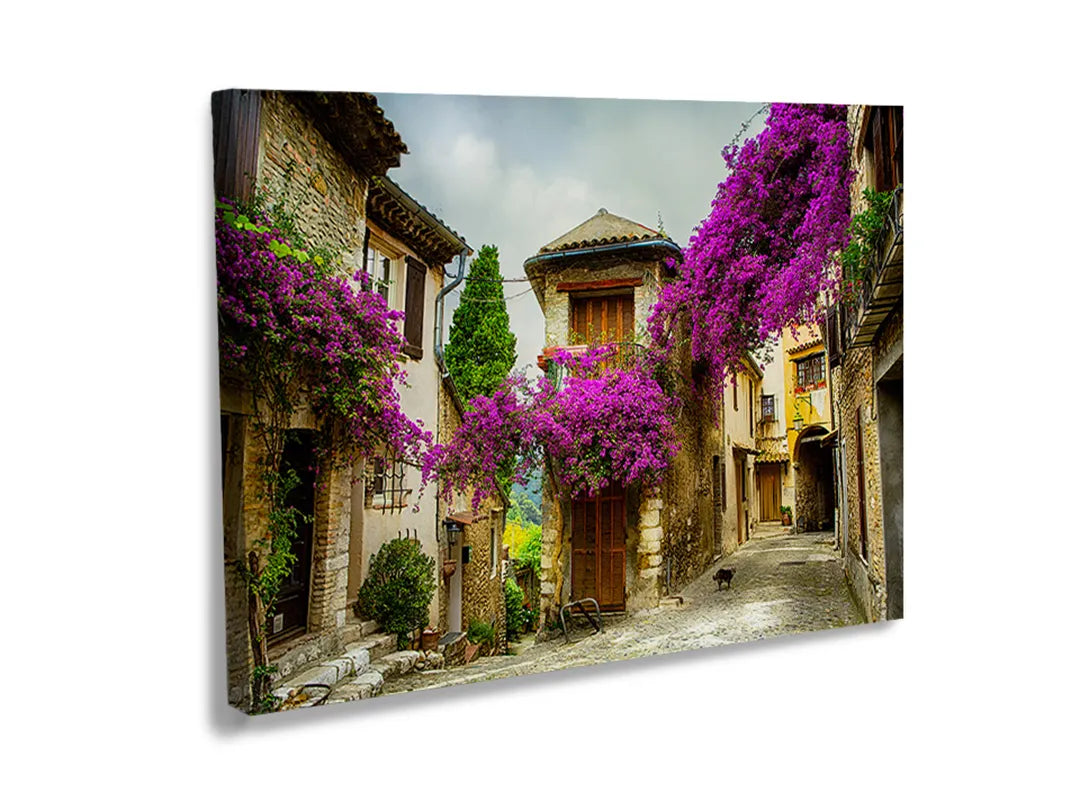 Kurkborden op canvas met mediterrane straat met paarse bloemen – formaat 120 × 80 cm